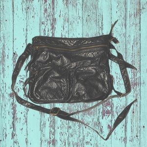 Sonoma Crossbody Purse in Black faux textured leather zipper pockets detail